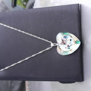 Wolf and dreamcatcher heart necklace